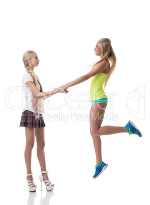 Sport or study. Girl holds hand of friend jumping