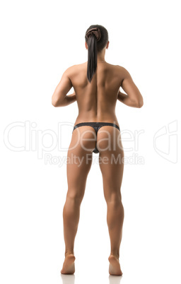 Topless female athlete posing back to camera
