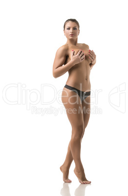 Seductive female athlete posing nude to waist