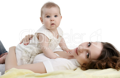 Studio shot of happy mother and her adorable child