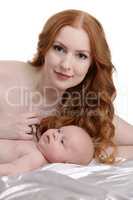 Beautiful red-haired woman and her little son