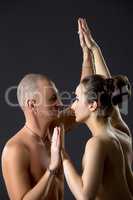 Sexual yoga. Portrait of naked partners training