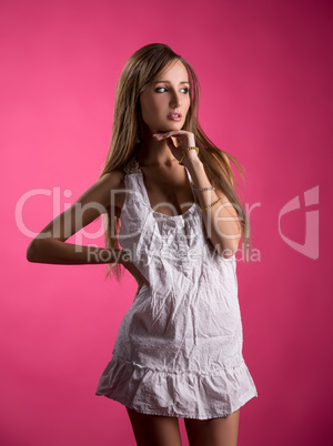 Studio photo of seductive model in nightgown