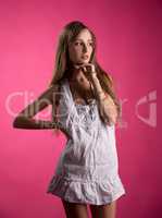 Studio photo of seductive model in nightgown