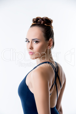 Portrait of pretty ballerina with cute hairstyle