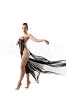 Nude. Sensual modern dancer posing on tiptoe