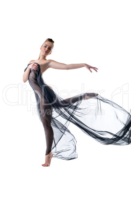 Nude graceful dancer posing with flying fabric