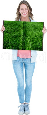 Woman holding lawn book Woman holding lawn book