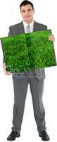 Man holding lawn book