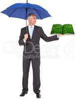 Man holding umbrella and lawn book