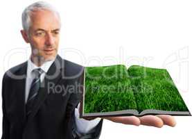 Man showing lawn book