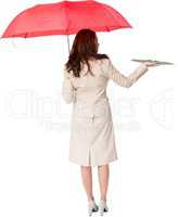 Woman with umbrella and lawn book