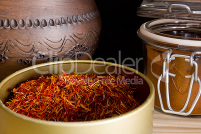 Strands of saffron powder and saffron