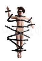 BDSM concept. Naked woman tied with duct tape