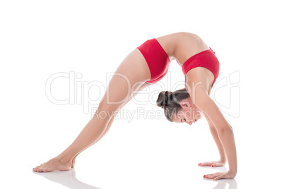 Rhythmic gymnast posing with her eyes closed