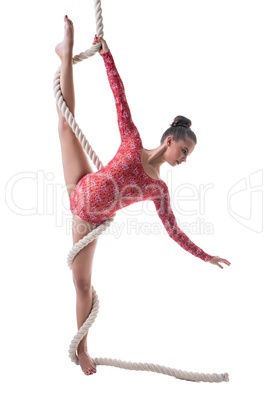 Graceful gymnast doing vertical splits with rope