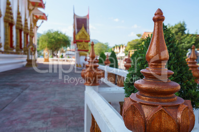 Ornate fence of Thai temple, close-up