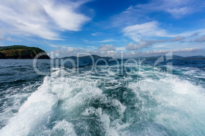 Boat trip on sunny day. Image of waves and sea