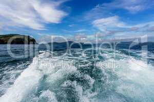 Boat trip on sunny day. Image of waves and sea