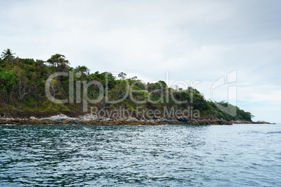 Seascape while boating. View of island coast