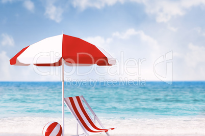 Composite image of image of sun lounger and sunshade