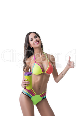 Happy woman with perfect body shows thumb up