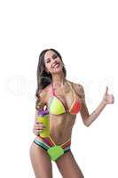 Happy woman with perfect body shows thumb up