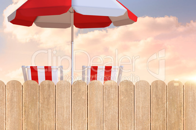 Composite image of image of sun lounger and sunshade