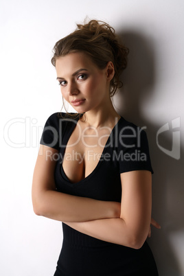 Charming lady in black dress with neckline