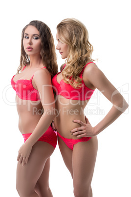 Two beautiful girls advertise stylish underwear