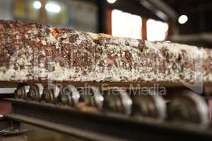 Woodworking process. Close-up of wooden bar