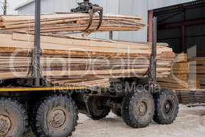 Sawmill. Image of truck transports boards