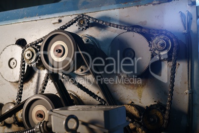 Close-up of rotating gears on running machine