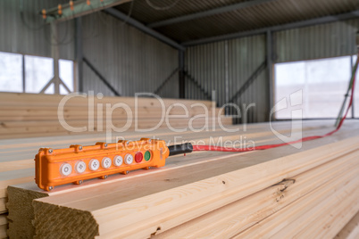 Image of remote control for crane loading timber
