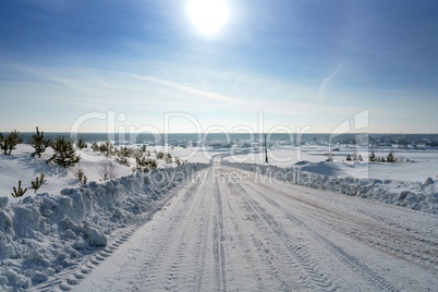 Countryside. Image of road to village in winter