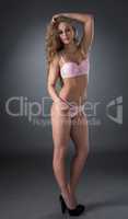 Underwear catalog. Gorgeous model in pink lingerie