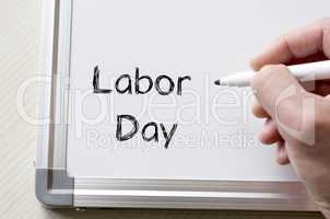 Labor day written on whiteboard