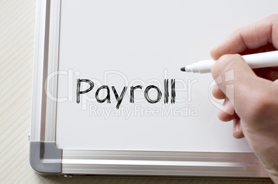 Payroll written on whiteboard