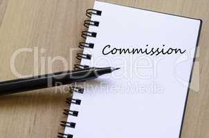 Commission write on notebook