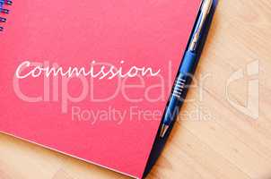 Commission write on notebook