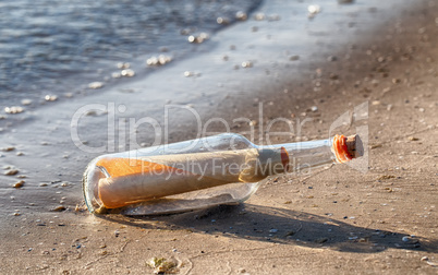 Letter Inside The Bottle On A Beach