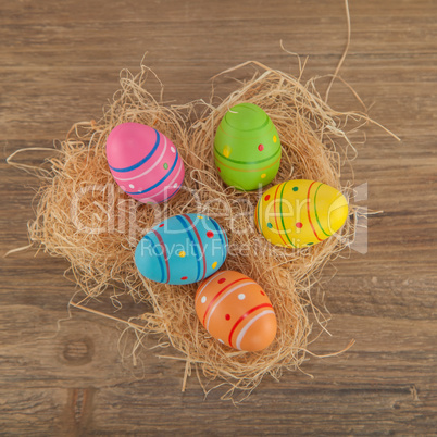 colourful easter eggs in a nest