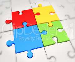 Focus on four colored puzzle pieces