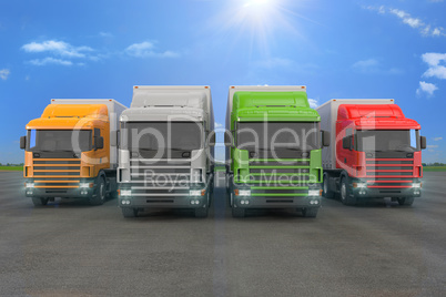 four colorful cargo trucks parked in a row