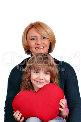 happy mother and daughter with red heart