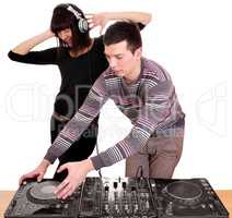 dj and girl playing music and dancing