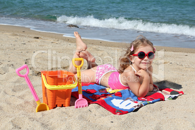 beauty little girl on the beach