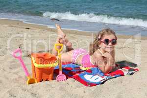 beauty little girl on the beach