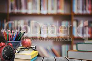 Composite image of school supplies on desk