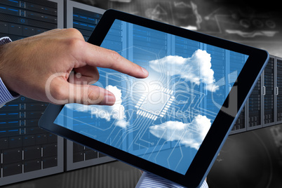 Composite image of man using tablet pc Composite image of man using tablet pc